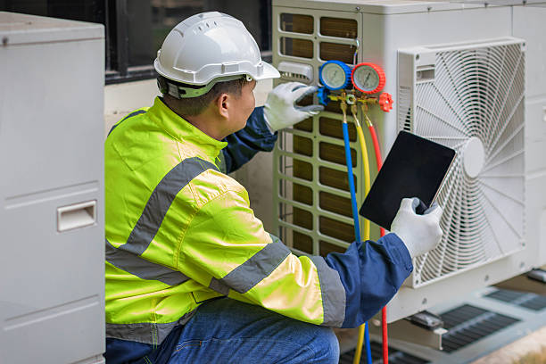 Professional Air Duct Cleaning technician working in Howe, TX